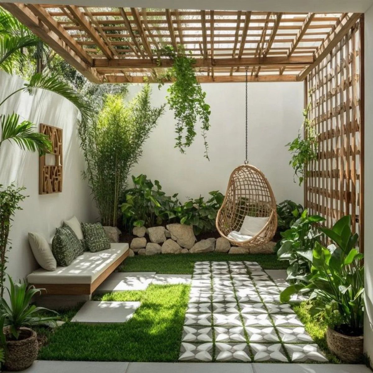 A small courtyard garden with a wooden pergola, hanging chair, and lush tropical plants.